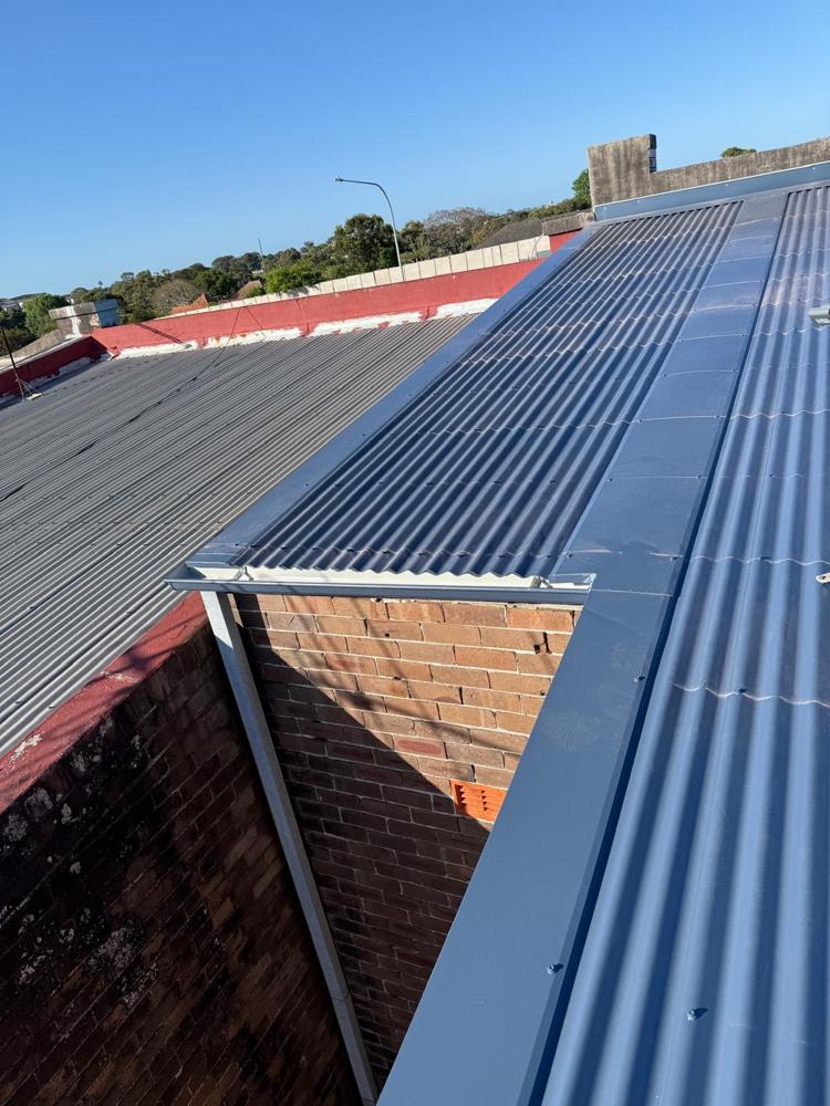 New blue Colorbond roof on a brick home